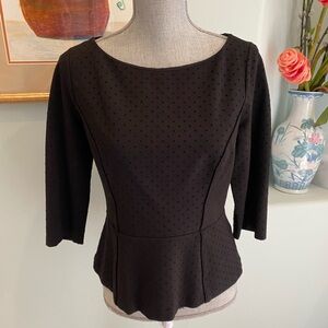 Classic Black Peplum Chic top!